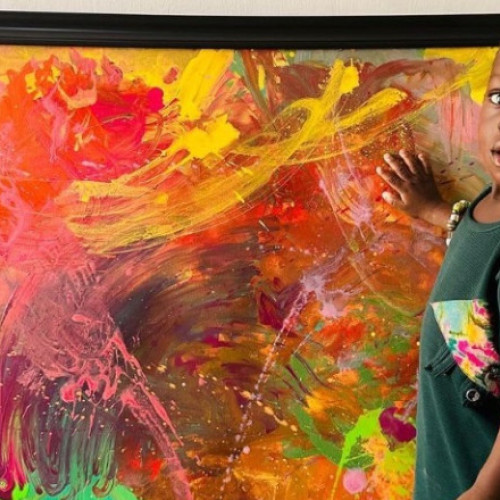 Galerie Foto Un copil în vârstă de un an din Africa a fost numit cel mai tânăr pictor din lume